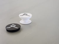 Collapsible Grip & Stand for Phones and Tablets   Offers a secure grip so you can text with one hand, snap better photos, and stop phone drops Functions as a convenient stand so you can watch videos on the fly Allows for hands-free use with the PopSockets mount