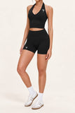 Playtimezover Purple Label black matching activewear set front three-quarter view